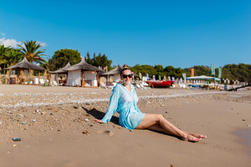 Beautiful young woman relaxing on the beach in Greece - the most beautiful woman in the world © fotofrol