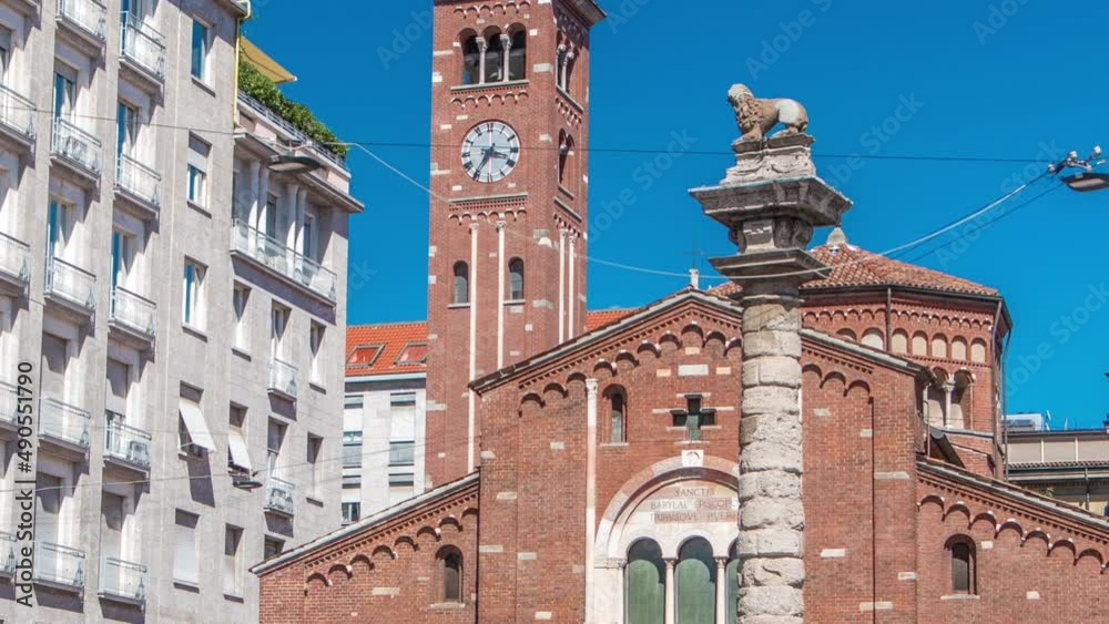 Wall mural Church of San Babila timelapse and the column with lion on the top on Avenue Buenos Aires in Milan