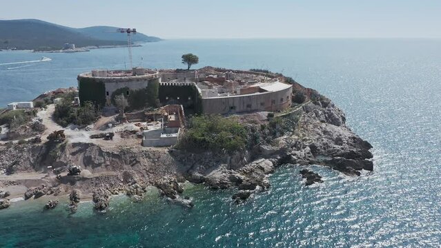 Montenegro. Island and fortress Mamula. Lastavitsa. Bay of Kotor, Adriatic Sea. Rebuilding the fortress into a hotel. Concentration camp during World War II. Drone shooting. Aerial view from a drone