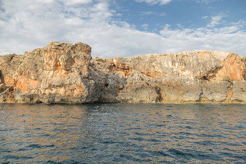 Fototapeta na wymiar Sunset in a cove of Menorca