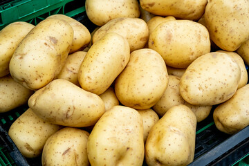 Fresh Uncooked Potatoes On A Market Stall