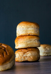 burger buns on wooden table