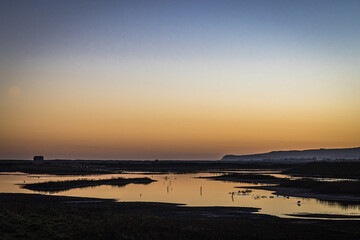 Sunset over Rye Harbour Nature Reserve, East Sussex, England