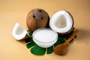 Coconut oil with fresh nut. Healthy alternative oil for cooking and skin care.