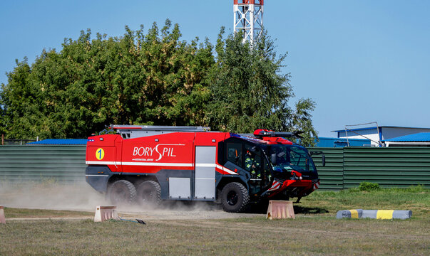 KYIV, UKRAINE - MAY 13 2021: Modern red airport fire truck Rosenbauer Panther ready for action. Space for text. Accident prevention. Boryspil International Airport. Airport firefighting service.