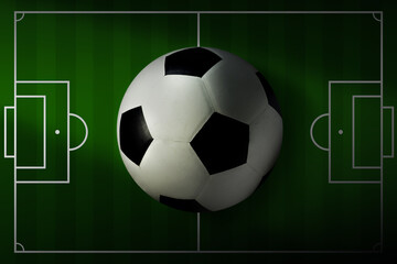 top view of a soccer ball and football field in a green vector field