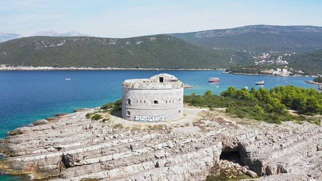 For tarzan in Montenegro. Fortress Arza in the Bay of Kotor on the peninsula of Lustica. Adriatic sea Montenegro.  Fortress for military defense. Aerial photo from the drone.
