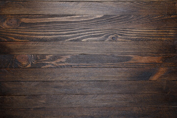 Dark stained wooden table texture background