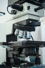 Examination of analyzes using a microscope. Laboratory with microscope