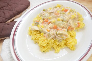 Chicken Gravy with Vegetables Over Yellow Rice	