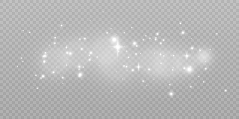 Sparks of dust and bright stars shine with a special light. Vector sparkles on a transparent background. Christmas light effect. Shiny magical dust particles.