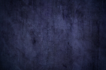Obraz na płótnie Canvas Grunge textured dark purple concrete wall surface for background