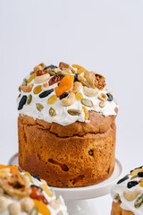 Easter cakes with nuts and dried fruits. White background