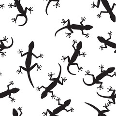 Black silhouette of lizard on white background. Seamless pattern. Illustration.