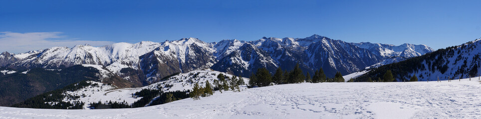 Fototapeta na wymiar France, Ariege, Mountains Pyrenees, winter sports scene, skiers on the slopes, High quality 4k footage