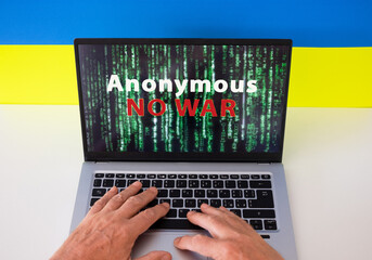 Flag of Ukraine on the background and No War message on digital screen. War with Russia. Cyber attack, sanctions, economic collapse. Message for world peace