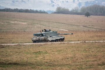 Fototapeta premium British army FV4034 Challenger 2 main battle tank in action on a military exercise, Salisbury Plain Wiltshire UK