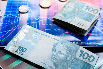 Brazilian money over a chart