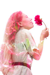 Young woman with long blonde hair and green dress is holding red dahlia flower and smiling on white background. Double exposure with red flowers, floral background, conception of fragrance,, vertical 