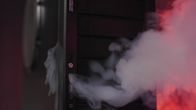 The home gaming computer overheated, turned off and smoked. The PC burned down. White puffs of smoke from the computer. The game video card may have failed.