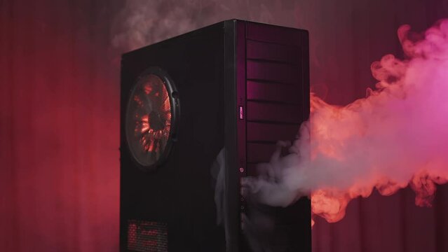 The desktop home computer overheated, smoked and turned off. Thick smoke poured out of the PC case.