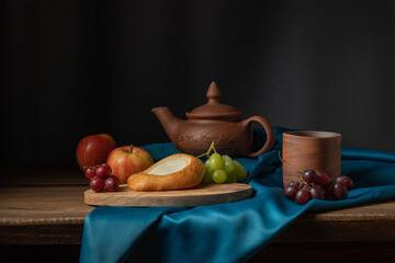 Still life with fruit and a tortilla