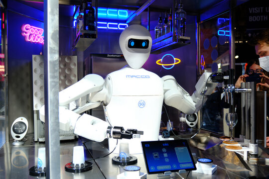 Barcelona, Spain - March 2nd 2022 - Mobile World Congress - Macco Robot At Telefonica Booth Serving Wine