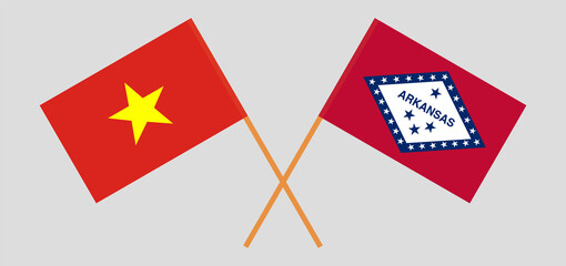 Crossed flags of Vietnam and The State of Arkansas. Official colors. Correct proportion