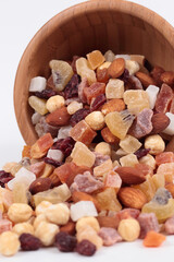 Dried fruits and nuts in a bambus bowl.