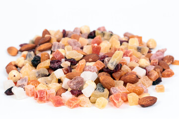 Healthy dried fruits and nuts on a white background.