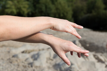 Woman arms stretched in balon position alonge © JCDphoto