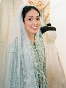 Young woman wearing a bridal veil