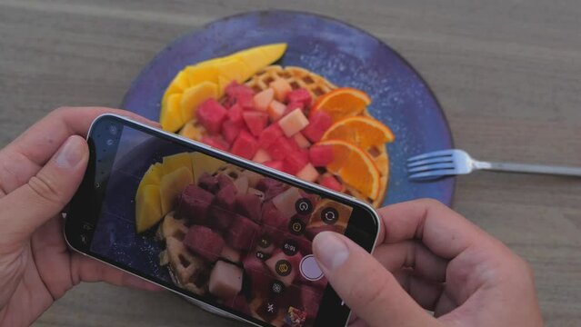 take pictures of food with a smartphone. Unrecognizable. Top view