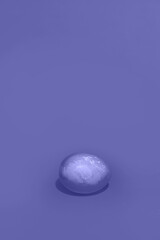 One egg of very peri color with space to copy. High quality photo