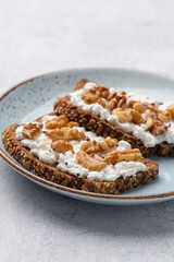 Sandwich with philadelphia and walnuts. Healthy nutritious paleo keto breakfast concept.