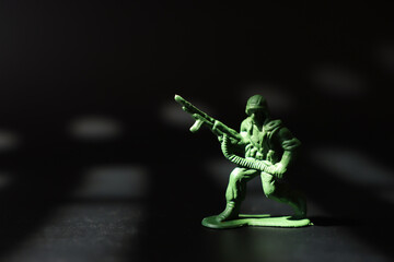image of toy soldiers over dark background
