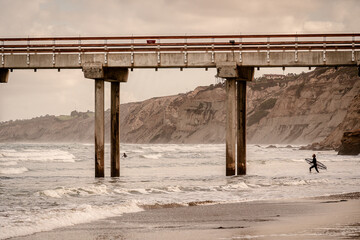 Fototapeta na wymiar beach pier and ocean wave scene