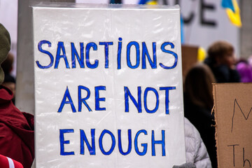 View of sign Sanctions are not enough during the rally against invasion of Ukraine in front of...