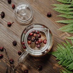 Dry briar berries on wooden table