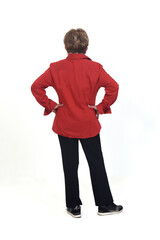 Fototapeta premium rear view of a senior woman hands on hip on white background