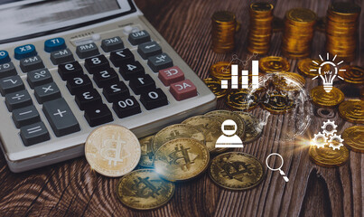Golden bitcoin digital currency, crypto money on calculator.