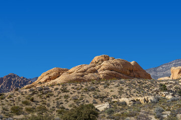 Large rock formation on a hill in the Red Rock Canyon area in Nevada