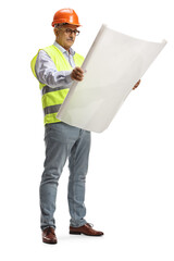 Full length portrait of a male engineer reading a blueprint