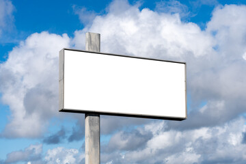 Fototapeta premium empty advertising billboard on the highway, with blue sky - advertising concept - mockup.