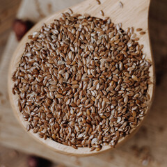 Linen seeds on the wooden table