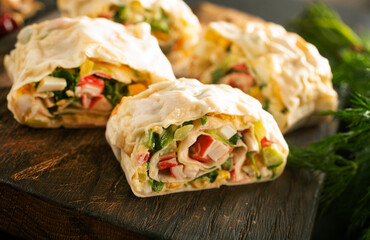 Lavash roll with crab, cheese and eggs, selective focus