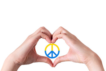 Hands showing a heart shape and a peace sign toned in the colors of the Ukrainian flag isolated on a background.