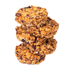 Tower of cookies with honey oatmeal grain isolated on the white