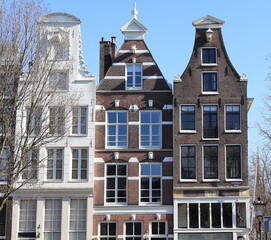 Fototapeta na wymiar Amsterdam Herengracht Canal House Facades with Various Gables, Netherlands