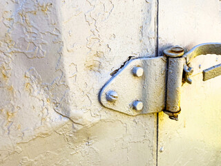 shutter of the old door to the booth. housing for builders. temporary house for people. gray metal...